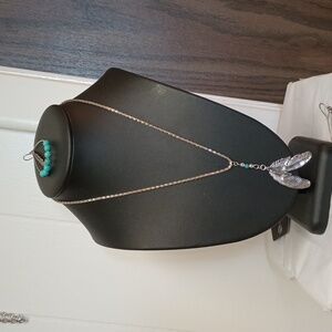 Silver toned feathers turquoise looking stone